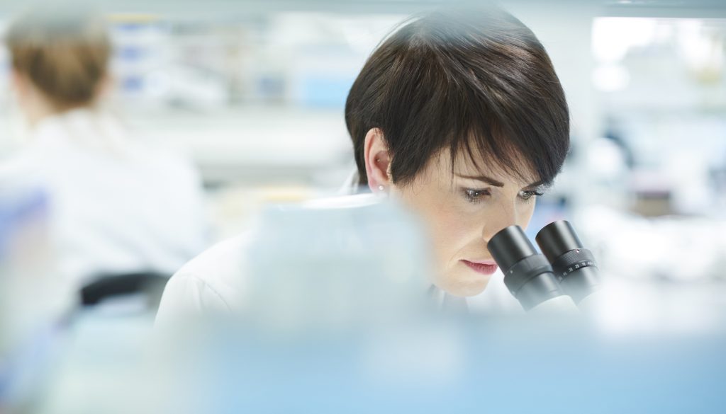 female scientist in research lab